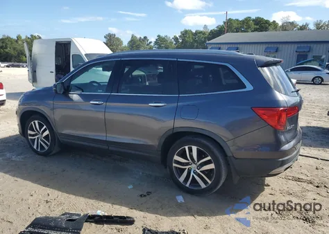 2018 Honda Pilot Touring z USA, uszkodzony, nr VIN 5FNYF5H98JB013874